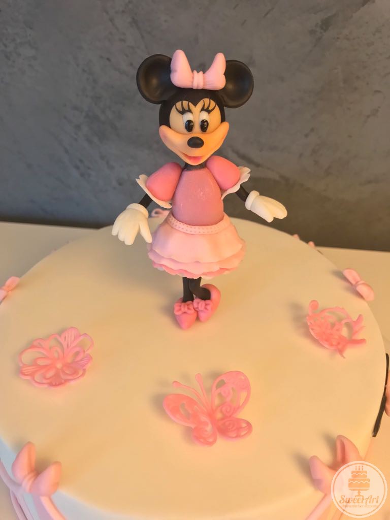 Șoricica Minnie - Minnie Mouse în rochiță elegantă roz cu volănașe, fluturași și floricele roz